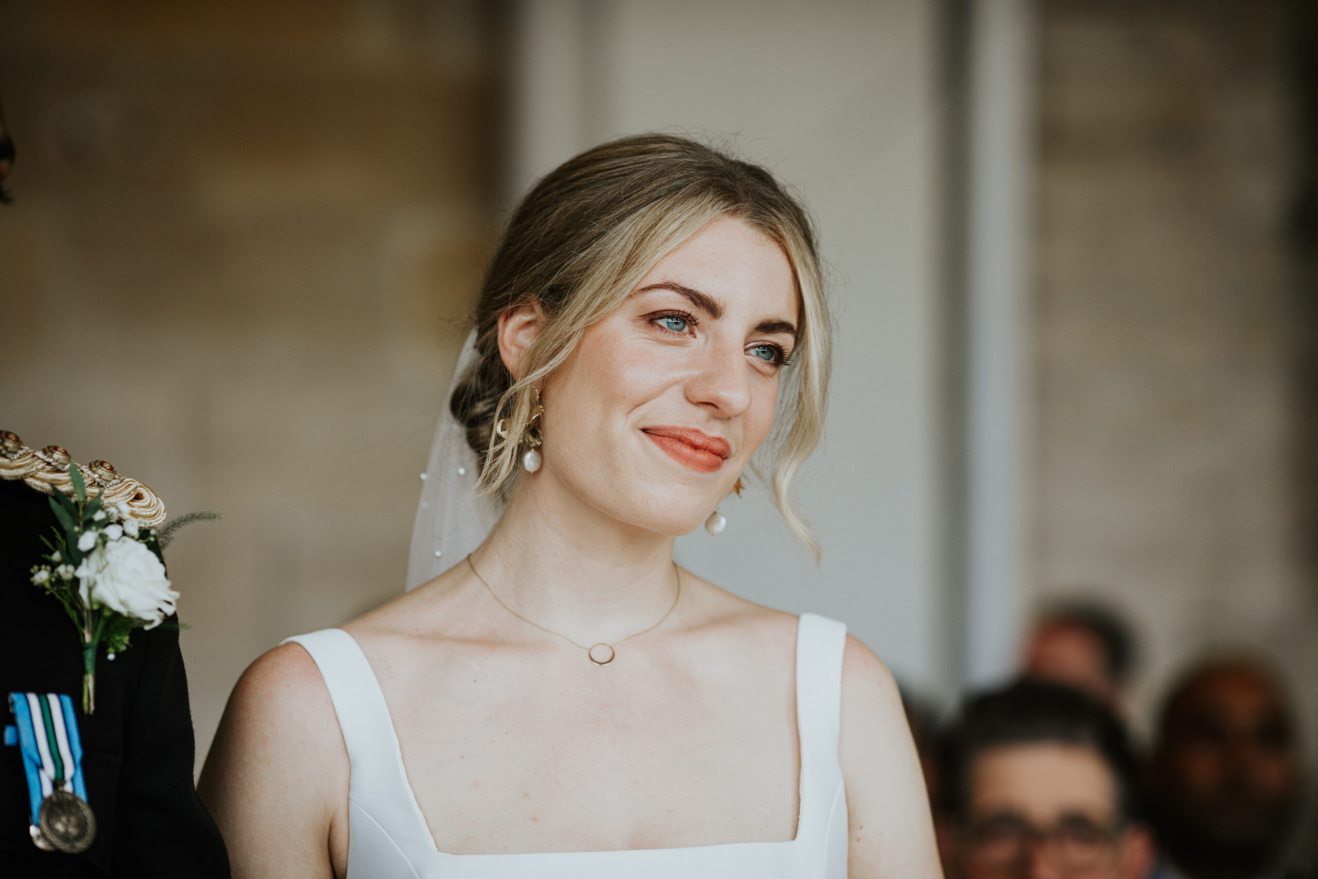 Smiling bride during their wedding ceremony.